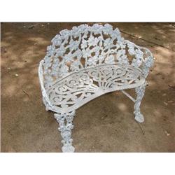 Ornate metal patio bench