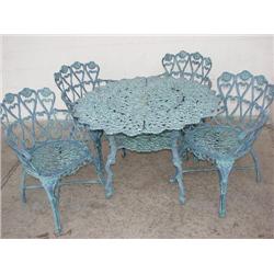 Iron patio table with 4 matching chairs