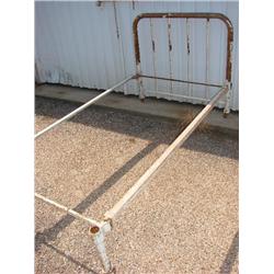White iron twin size bed with rails