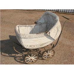 Antique white wicker baby carriage