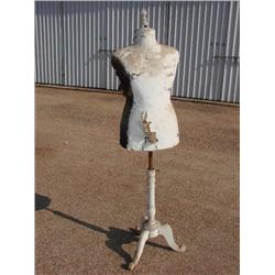 Antique dress form on wooden stand