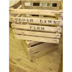 2 wood crates, one is marked"Cedar Lawn Farm"