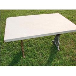 Unpolished marble top table with iron base