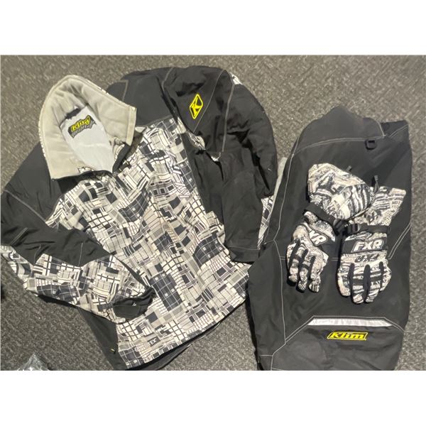 Blue Bag Filled With Assorted Mens Clothing