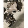 Image 2 : Group of assorted car parts - includes OEM Intake Manifold Subaru/ Alternator/Rear Drive Shaft Manua