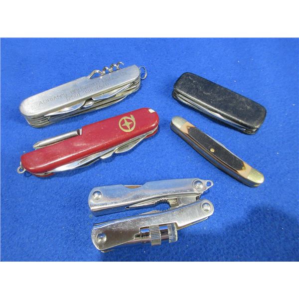 4 Folding Pocket Knives and a Multi-Tool Plier