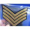 Image 2 : 3 Military Gold Mylar Chevrons and a Badge