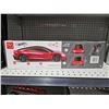 Image 3 : Hot Wheels RC Tesla Roadster 1:10 Remote-Control Tesla Roadster with Pistol Grip Remote