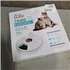 Image 2 : PET TIMED FEEDER AND GROOMING KIT