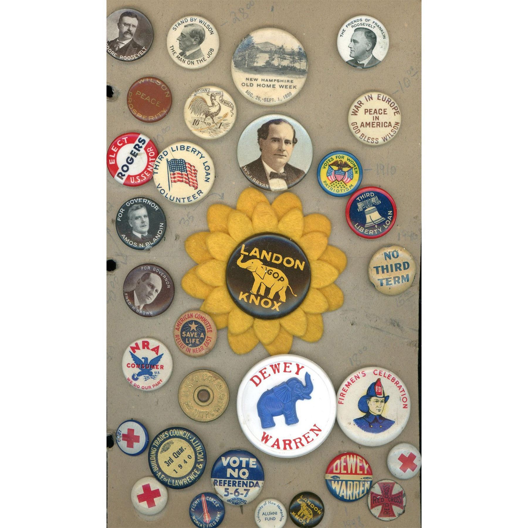 A card of assorted political pin back buttons