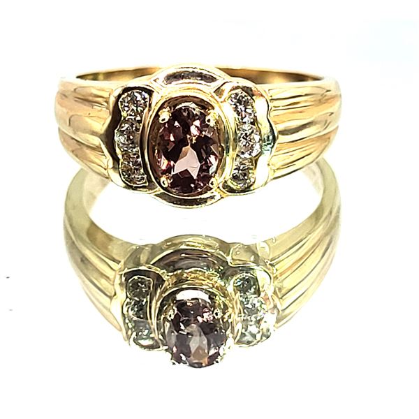 Intriguing Color-Changing Garnet and Diamond Ring