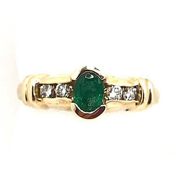 Oval-Cut Emerald Ring with Diamond Shoulders