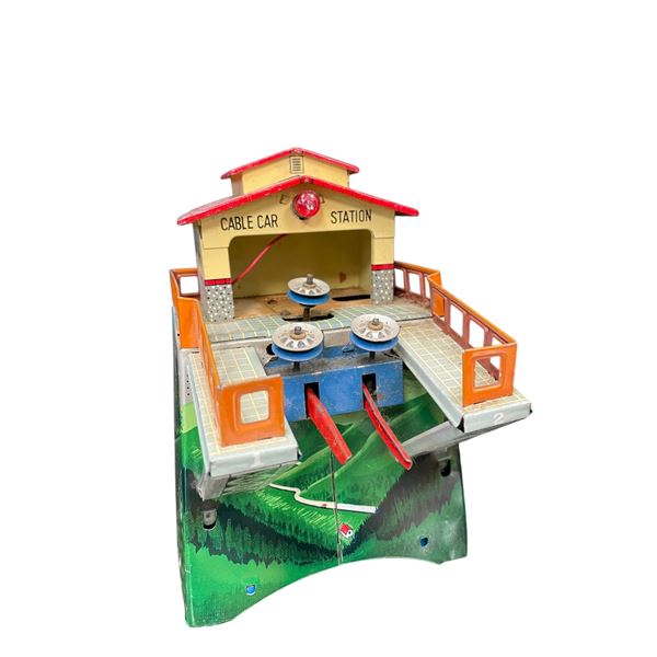 Vintage Tin Litho Battery Operated Cabe Car Station