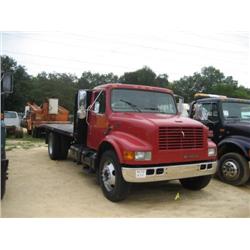 1999 INTERNATIONAL 4700 S/A FLATBED TRUCK