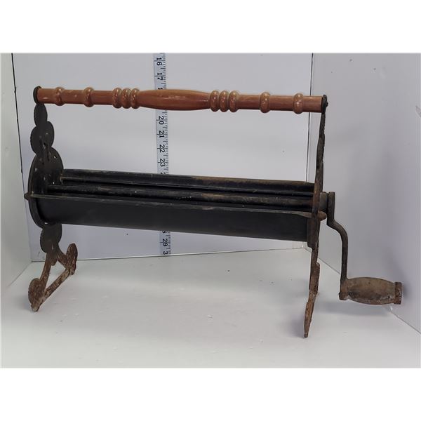 Vintage or Antique Cast Iron Wooden Handle Newspaper Log Roller