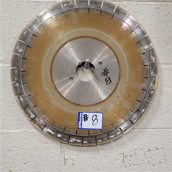 Approx. 22- 16-18 in used diamond blades & 12 x .5 in diamond fluting blade. Fits the Breton Saw (Lo