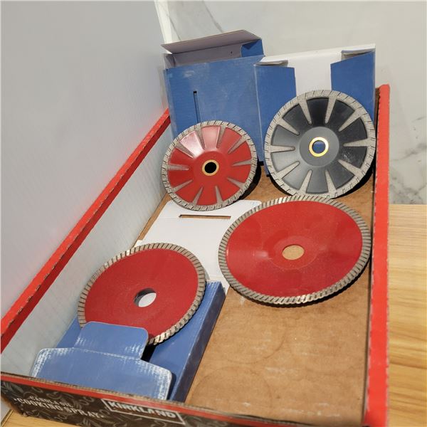 (Selling all together) 5- Approx. 5 1/6 in curved diamond cutting blades, new