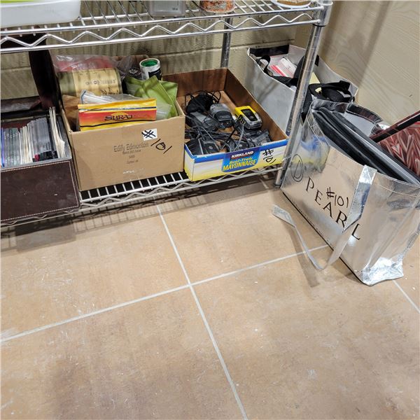 6- Motorola's, various CD's, Box of special teas, 2- bags of bags & folders