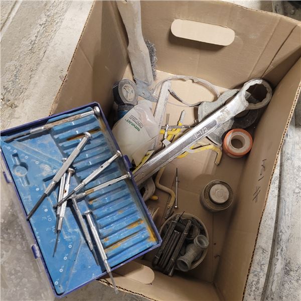 1 1/2 in wrench, precision screwdrivers (partial set) various tapes, wire etc.