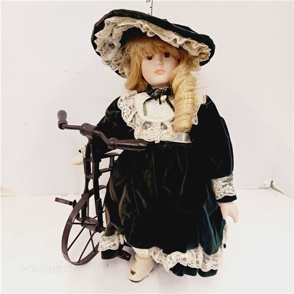 Porcelain Victorian Doll on Metal Trike