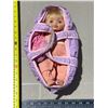 Image 1 : Doll in Baby Bed.