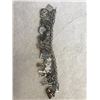 Image 2 : Sterling Silver charm bracelet with 36 Sterling Silver charms. Silver Weight: 113 gm (4 oz). Paper j