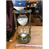 Image 1 : Brass and glass hour glass. Base 5” (13 cm) wide x 9.5” (24.5 cm) tall. No polishi