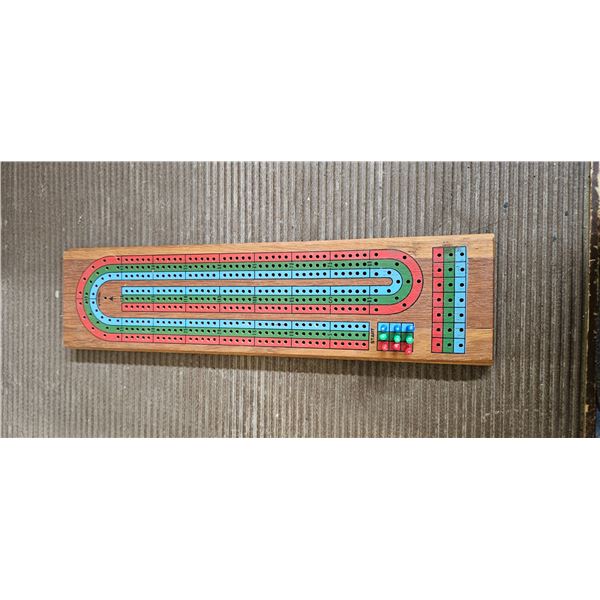 cribbage game board with pieces
