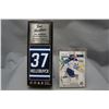 Image 1 : Connor hellebuyck hockey card an dtim hortons stick
