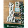 Image 2 : Riders 2 sets of cards, schedules, gloves etc.