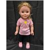 Image 1 : 18" doll with pink shirt and black pants.