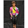Image 1 : Ken doll in outfit