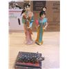 Image 2 : two dolls and a pig box