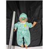 Image 1 : Baby doll in green sleeper