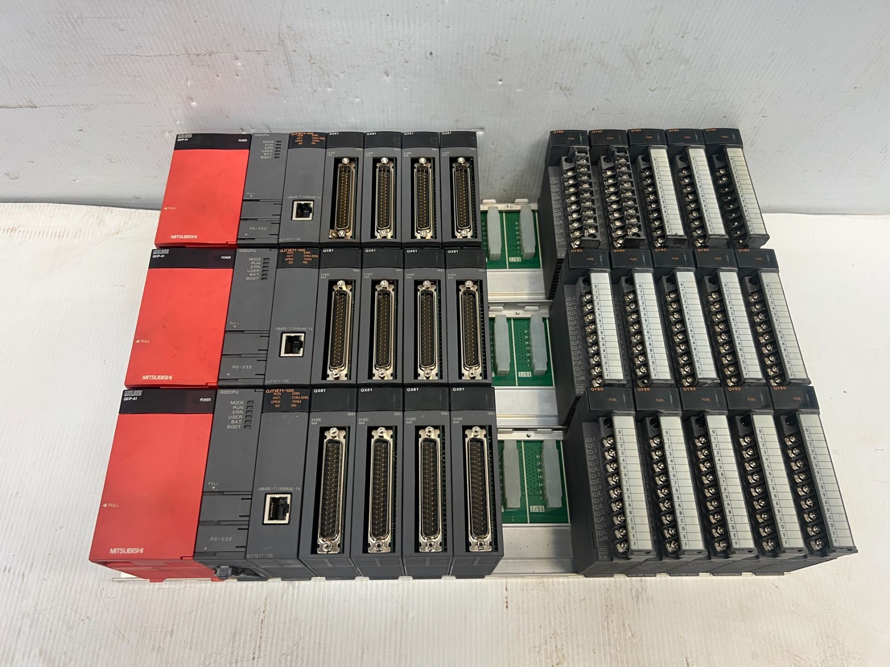 (3) Mitsubishi Racks w/Power Supplies & Modules as Pictured