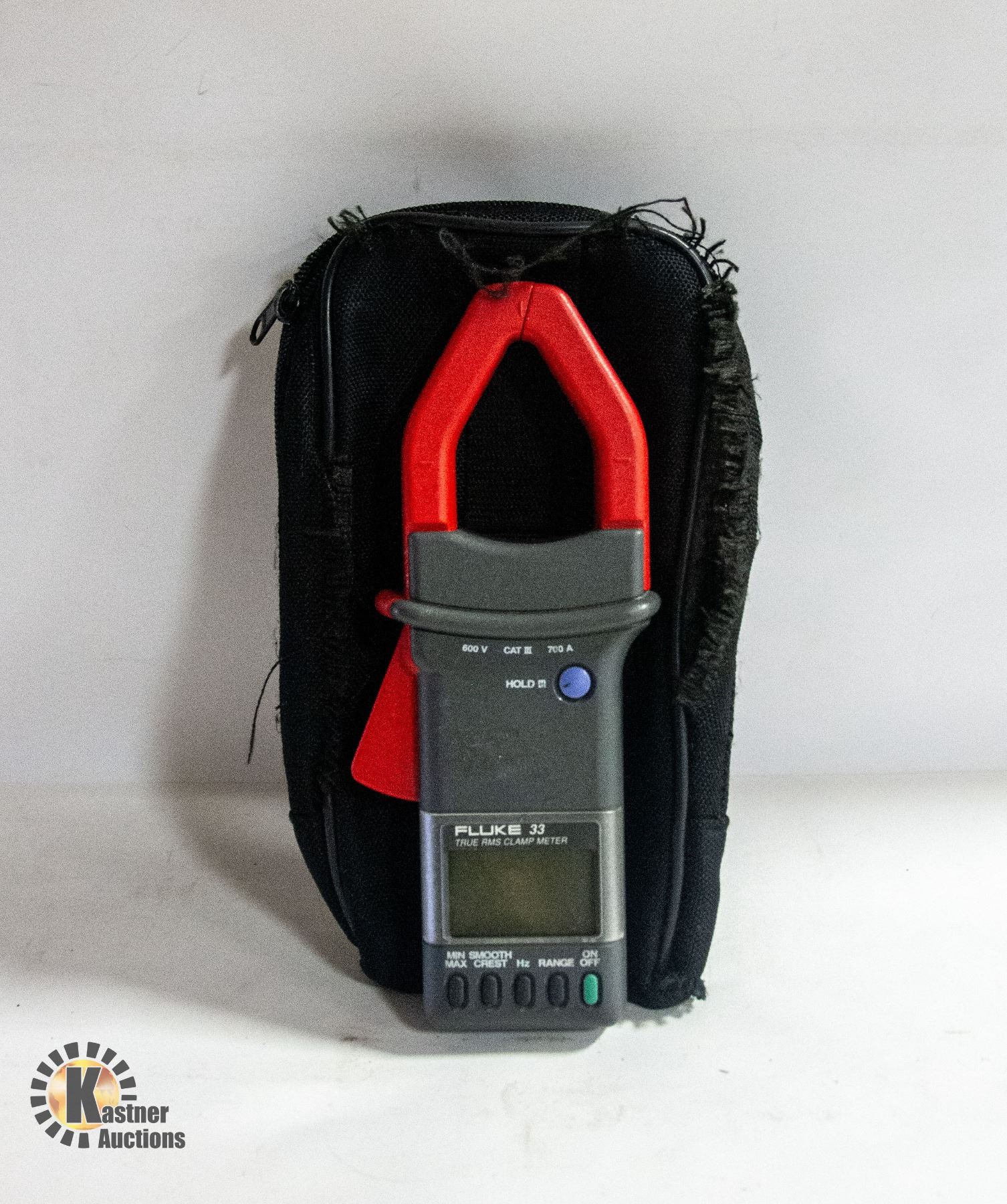 BOX WITH FLUKE 33 TRU RMS CLAMP METER WITH