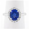 Image 1 : 14k White Gold 2.60 ctw Violet Blue Oval Tanzanite w/ Round Diamond Halo Ring