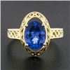 Image 2 : NEW 14k Gold 2.0 ctw Violet Blue Oval Tanzanite w/ Scroll Open Work Solitaire Ri