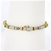 Image 2 : 14k TT Gold 2.02 ctw Oval Tanzanite & Round Diamonds 6.75" Line Tennis Bracelet