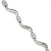 Image 5 : 18K Gold 7" 1.60 ctw Baguette Channel Set Diamond Dual Finish Wavy Link Bracelet