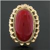 Image 2 : Vintage 18k Gold GIA Oval Cabochon Orange-Red Coral w/ Open Work Frame Ring