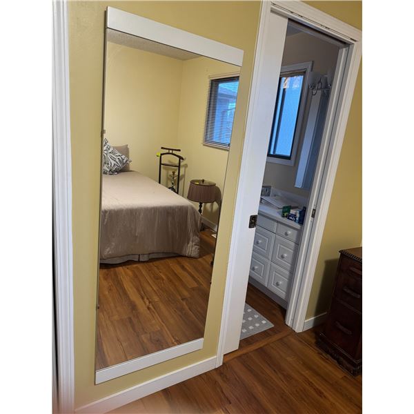 Hanging  mirror 23 and three-quarter inches by 63 inches