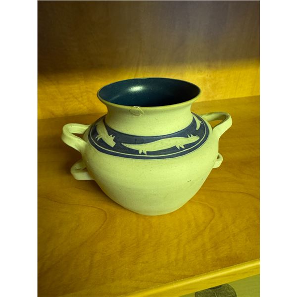 Pottery piece signed