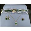 Image 1 : Emerald Style Solitaire Pendant & Chain with matching earrings and ring. incoudes new quartz wrist w