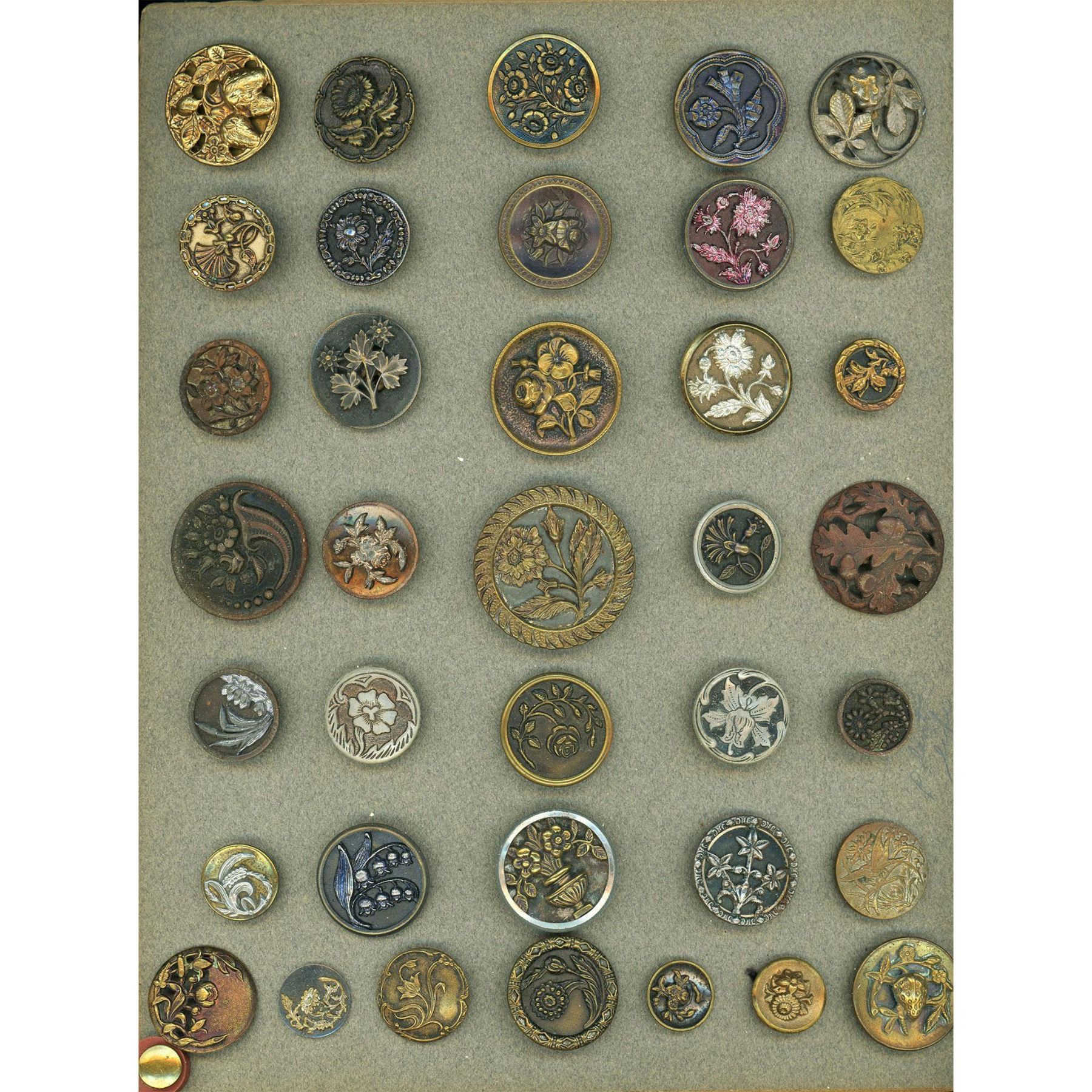 A card of assorted metal picture buttons