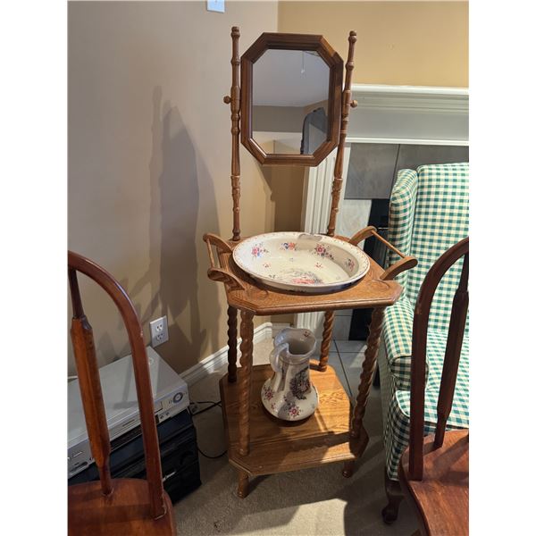 Antique wash basin and stand pitcher has been repaired