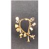 Image 1 : 10K CHARM BRACELET WITH MULTIPLE 10K CHARMS (36G)