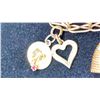 Image 2 : 10K CHARM BRACELET WITH MULTIPLE 10K CHARMS (36G)