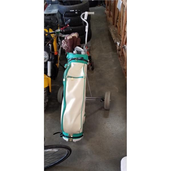 VINTAGE WILSON STAFF GOLF BAG AND CLUBS, WITH CART