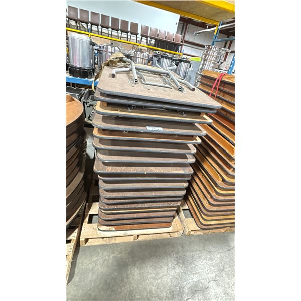 STACK OF 17-  4' WOODEN COMMERCIAL FOLDING BANQUET TABLES *MUST TAKE ALL*